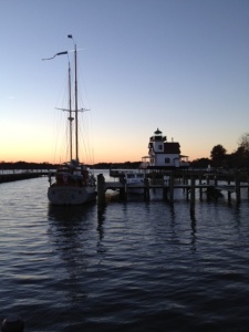 harbor sailboat and lighthouse